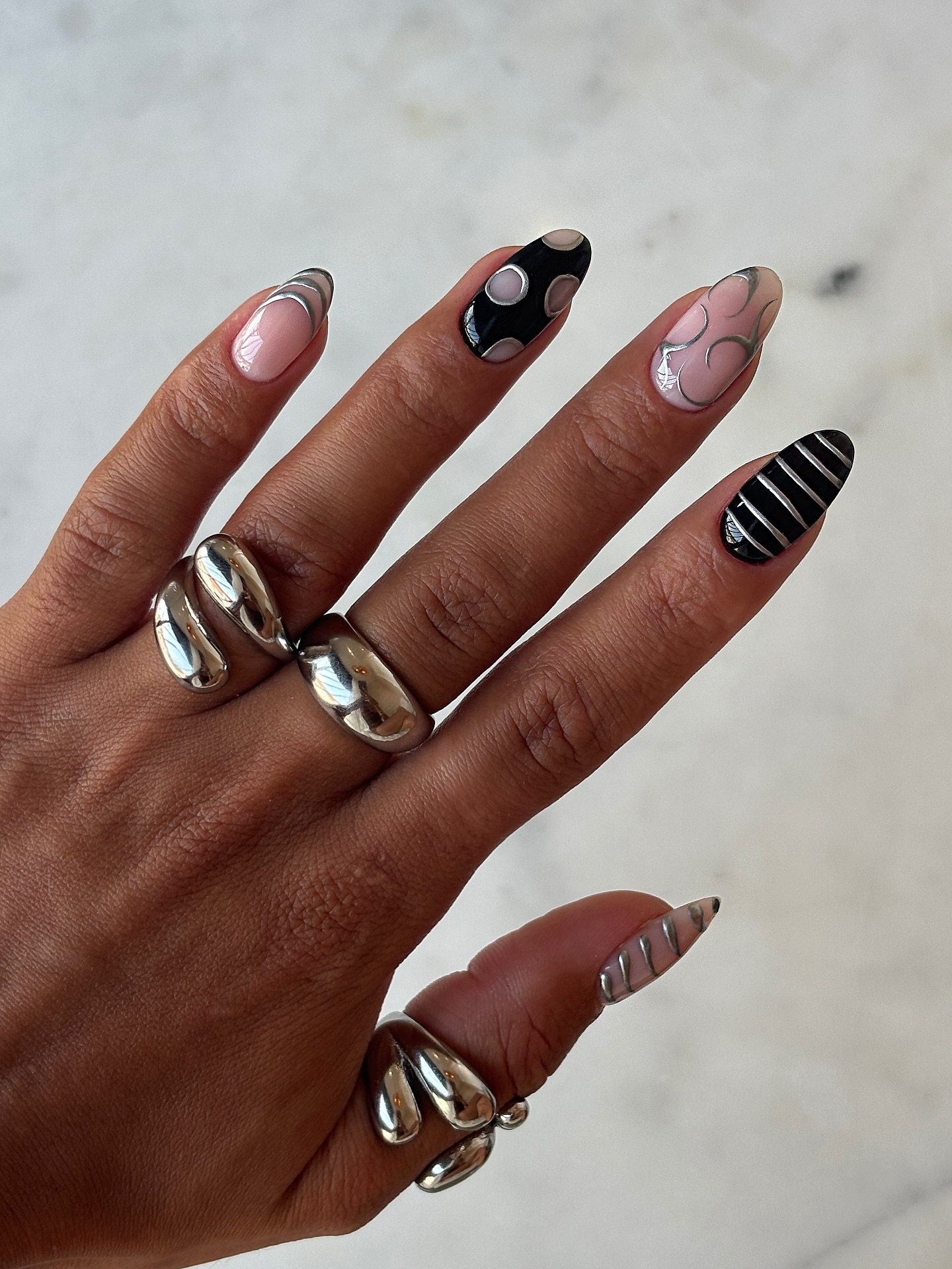 Black nail polish manicure design.