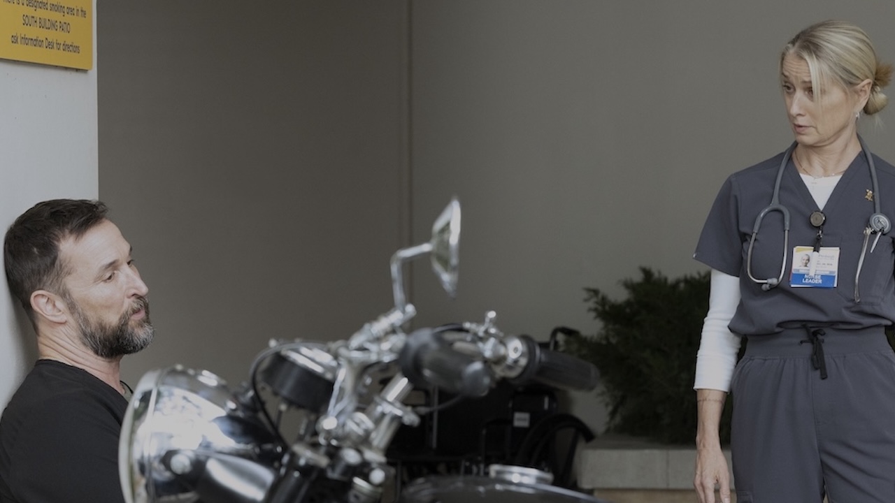 Dana checking on Robby in the ambulance bay in The Pitt 2x12