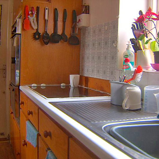 kitchen with wooden worktop cabinet and chest of drawers