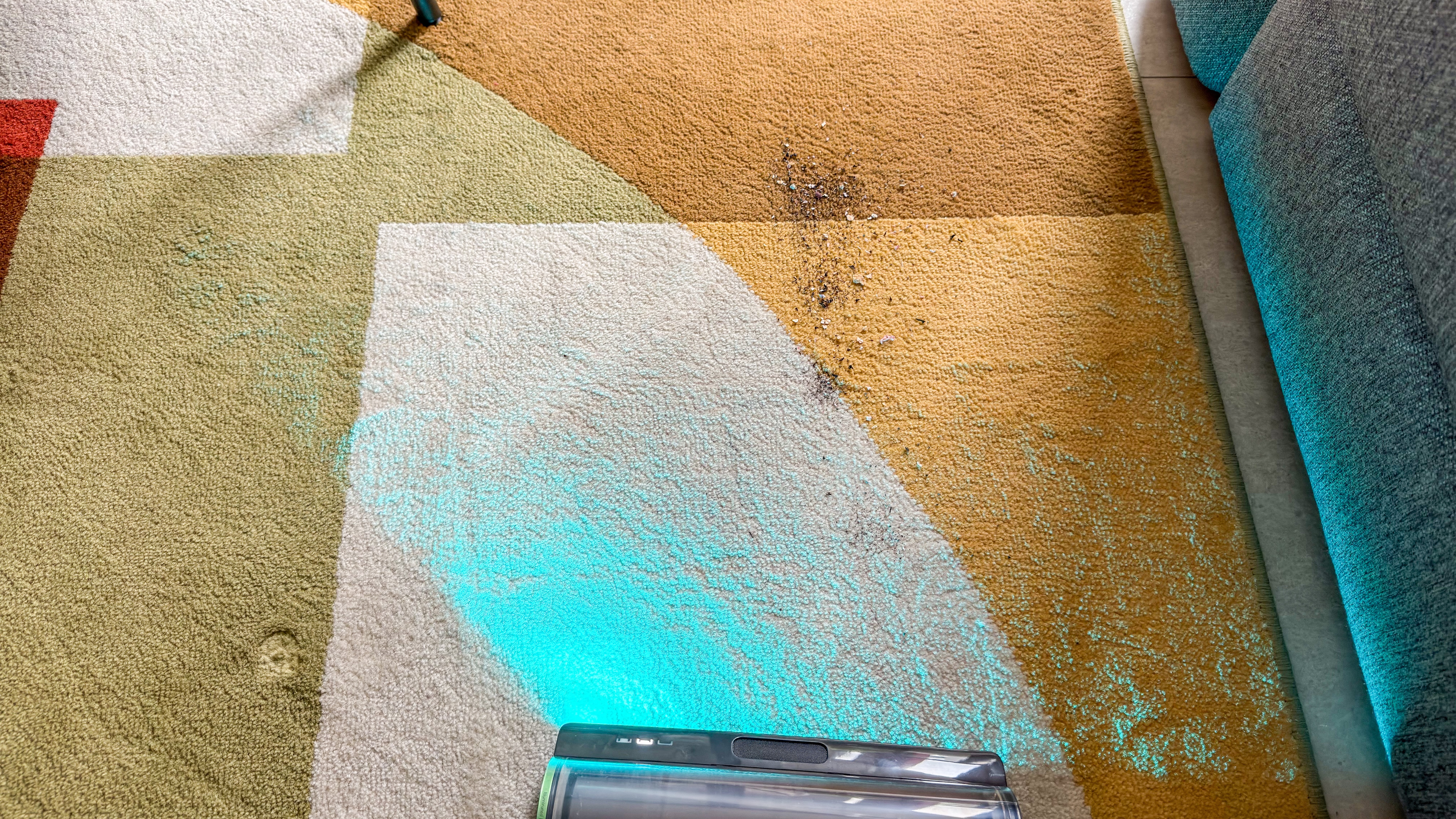 Dreame Z50 Station being used on a colourful rug