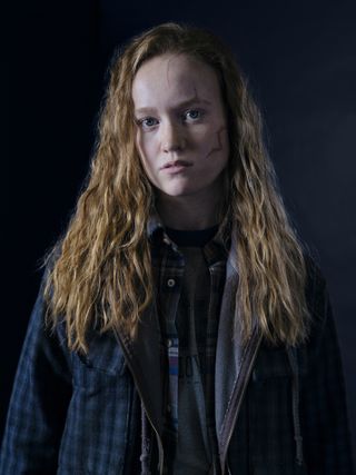 liv hewson poses as teen van with a scar on her face in a promotional shot for yellowjackets