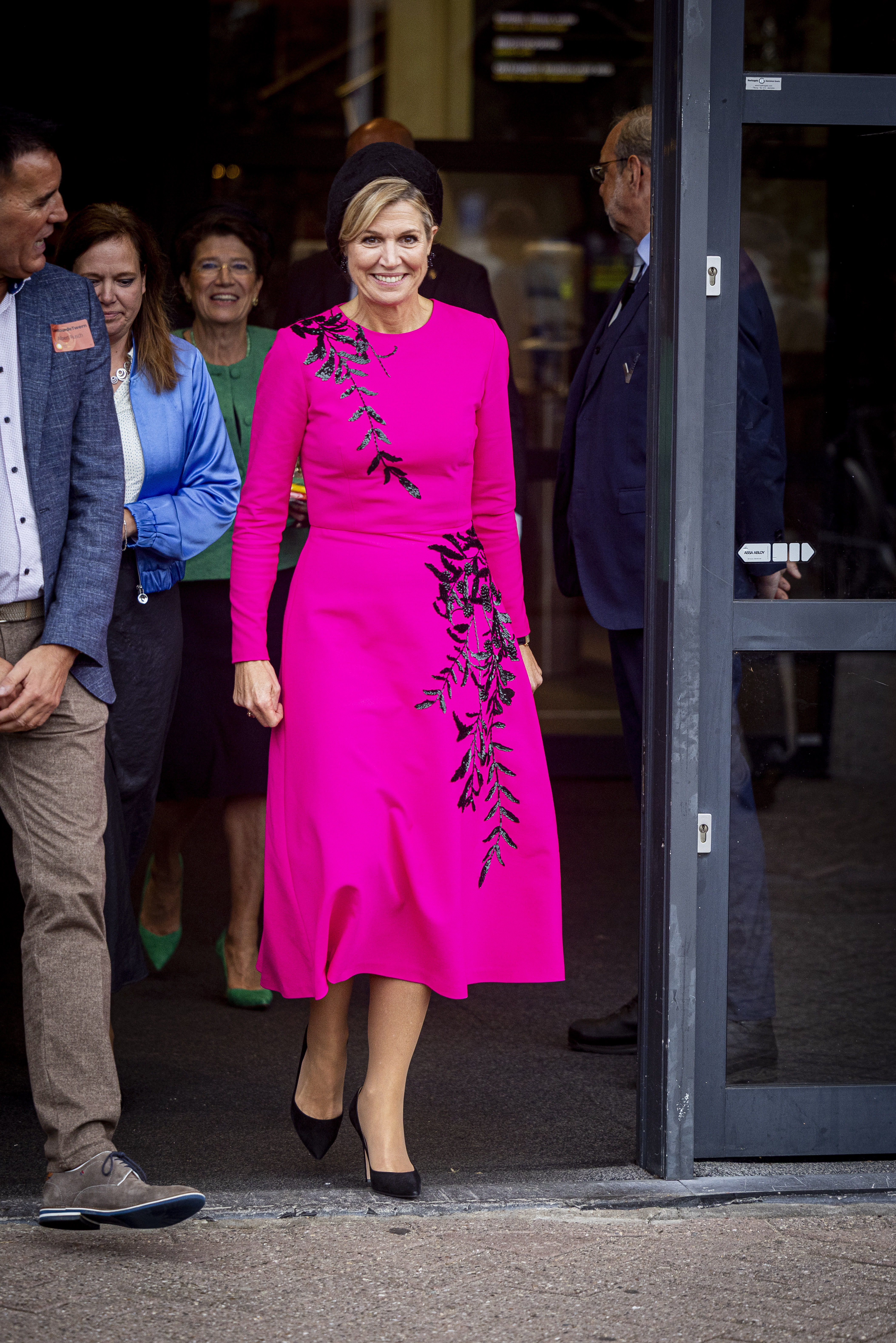 Queen Maxima wears fuchsia dress