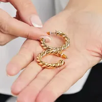ASOS Design 14k Gold Plated Twist Hoop Earrings, £14 £11.50 | ASOS