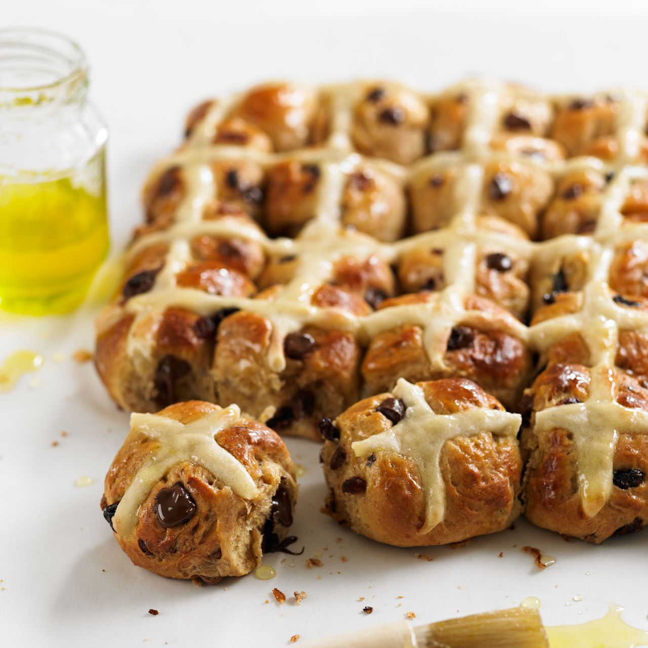 Photo of an orange choc-chip hot cross buns