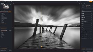 Radiant Photo 2 photo editing software an image of a bridge stretching out into a lake in black and white