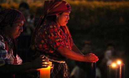Indigenous Mayans during a ceremonial prayer to welcome the upcoming 13th Baktun, an end to the mayan calendar in December 2012.