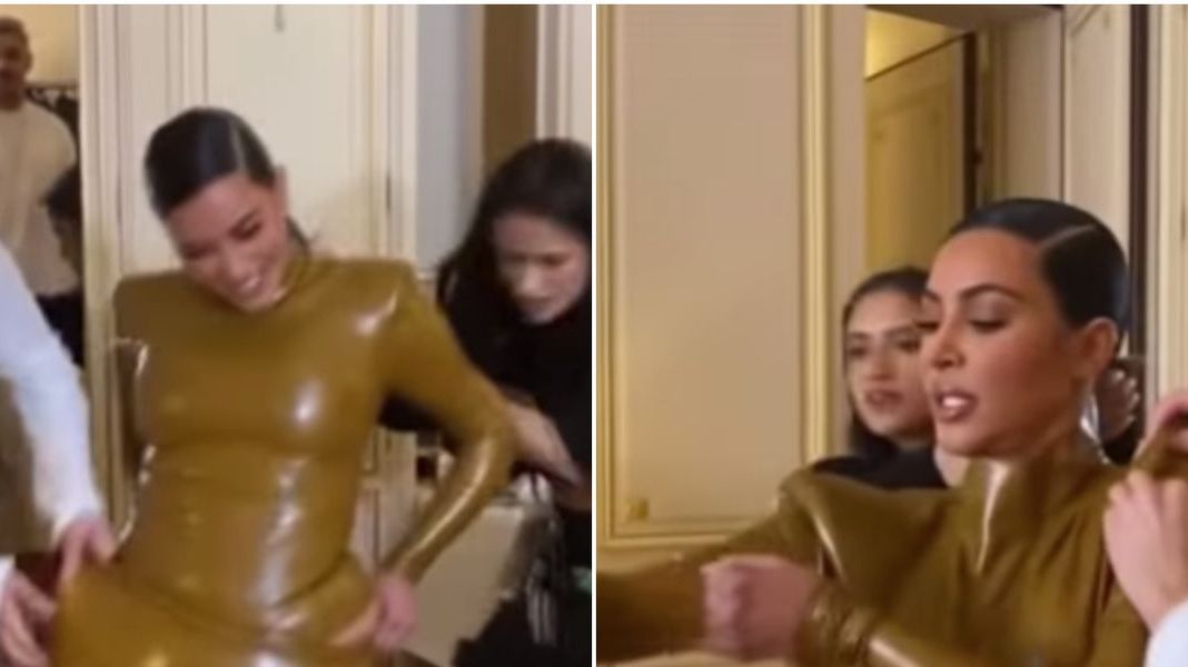 Watch Kim Kardashian squeeze into her latex suit during Paris