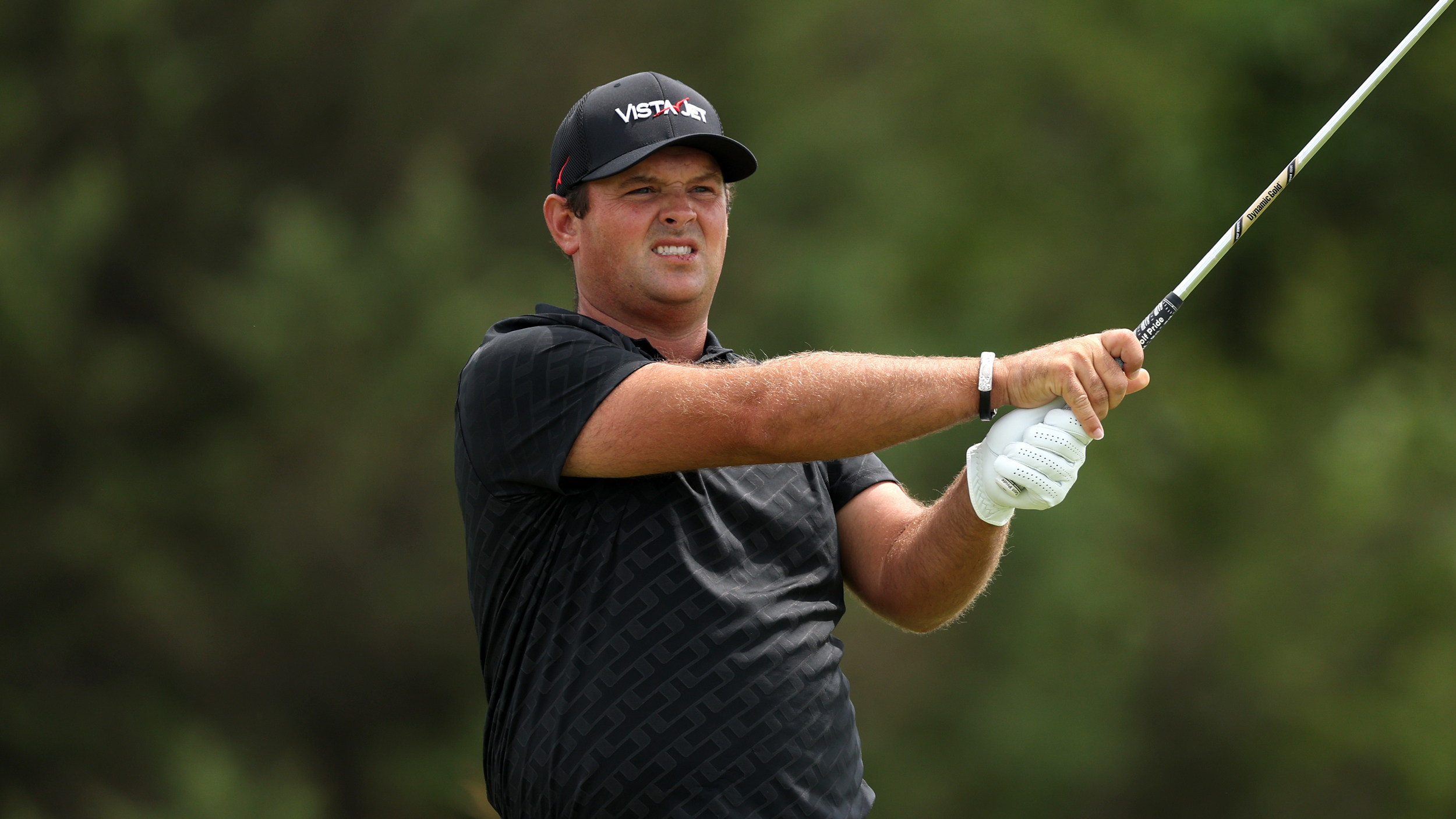 Patrick Reed holds his finish on an iron shot at the 2026 US Open