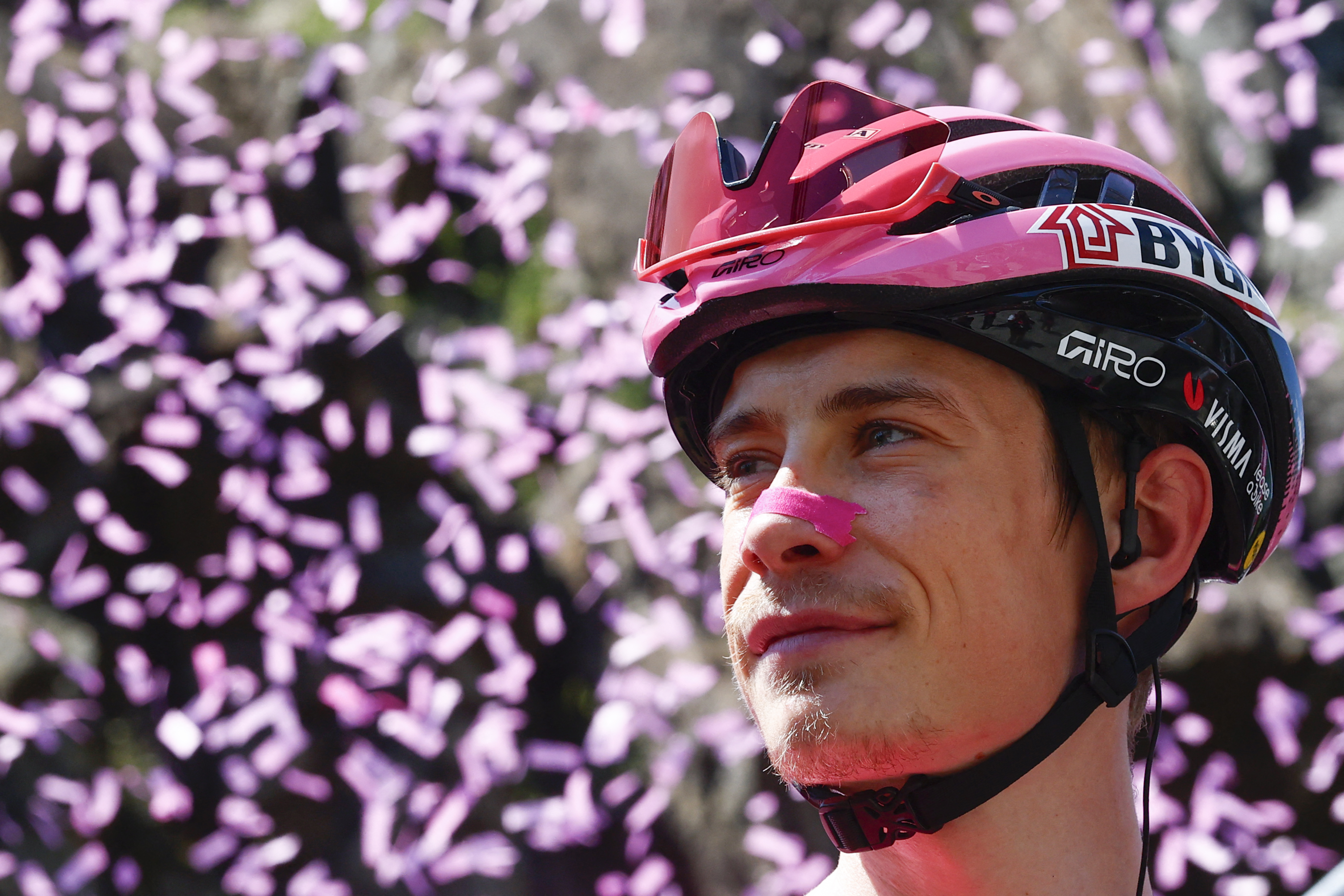 Jonas Vingegaard with pink confetti behind him