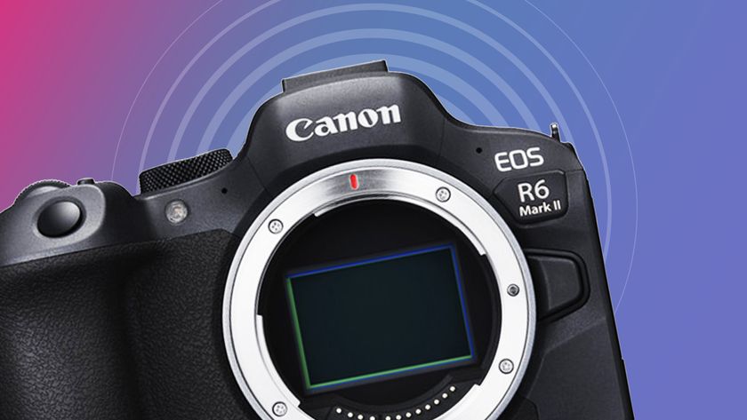 Canon EOS R6 Mark II camera on a magenta / blue background with radar overlay