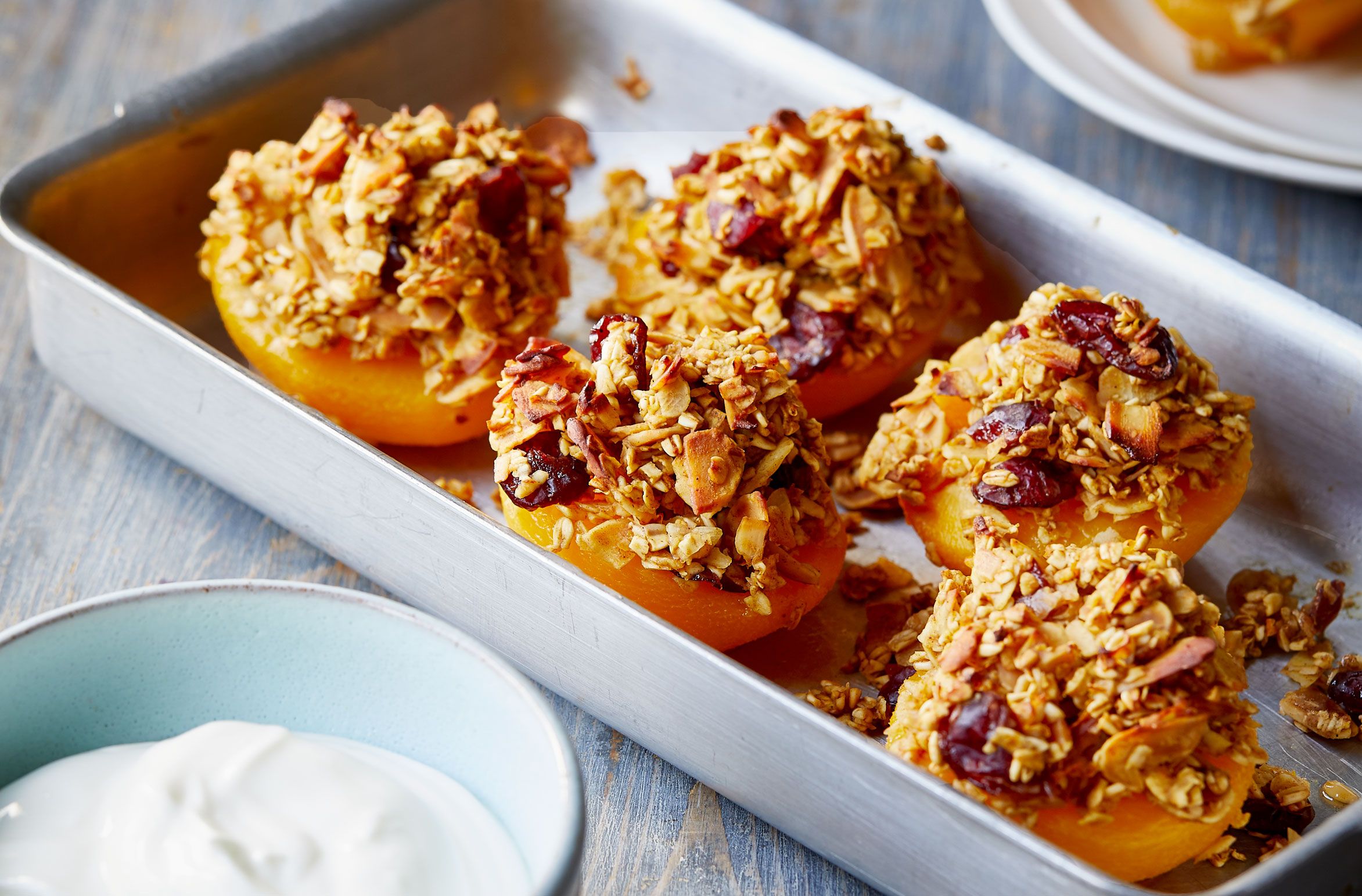 Eat Well for Less' baked almond and oat topped peaches recipe