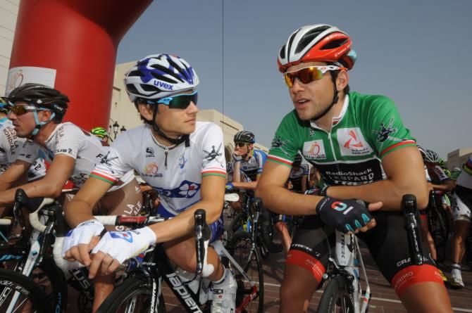 Best young rider Kenny Elissonde chats with Joaquim Rodriguez at the start