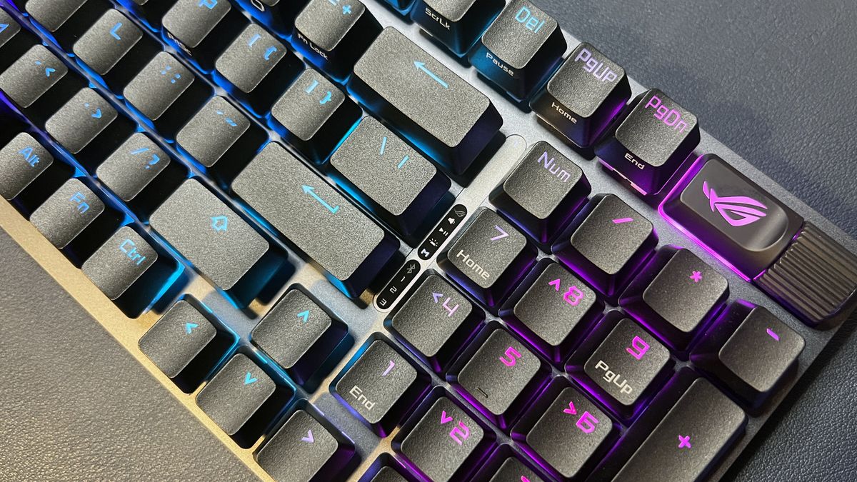 close up of the numberpad on black Asus gaming keyboard with RGB lighting