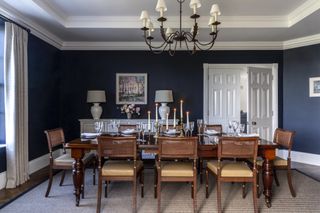 dark blue dining room by Sims Hilditch