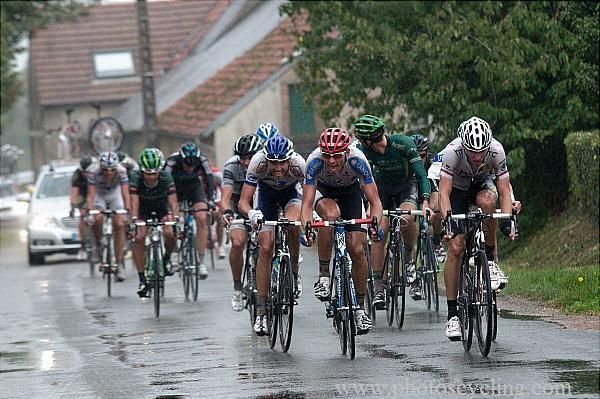 The road pounded down on the peloton