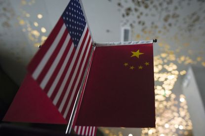 China, U.S. flags.