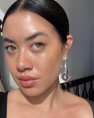 Content content creator Sasha Mei put here even, glowy skin on display