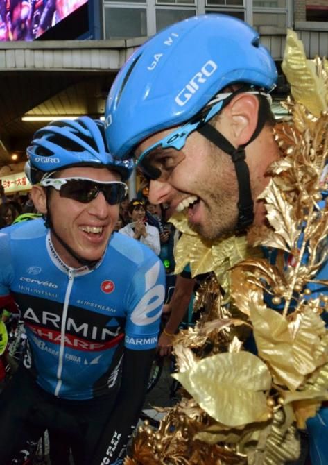 Dan Martin and Steele von Hoff celebrate the team's win at the Japan Cup.