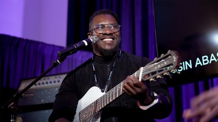 Tosin Abasi with the Cordoba Abasi Stage 7 during a Q&A at NAMM 2026