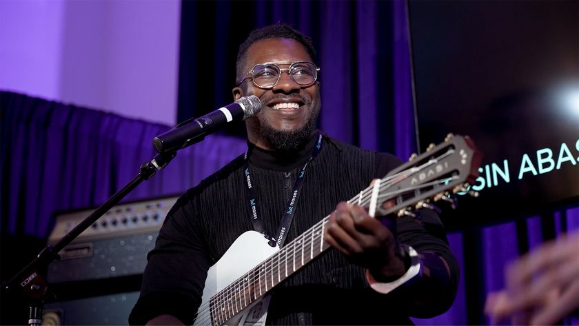 Tosin Abasi with the Cordoba Abasi Stage 7 during a Q&amp;A at NAMM 2026