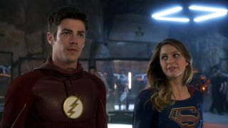 Barry Allen (Grant Gustin) and Kara Danvers (Melissa Benoist) prepare for a mission on Supergirl