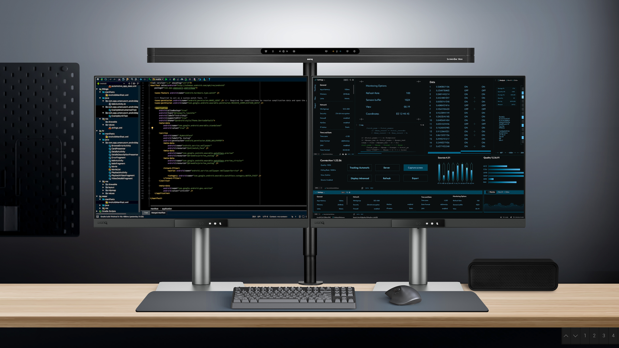 BenQ ScreenBar Max lighting up a dual-display setup