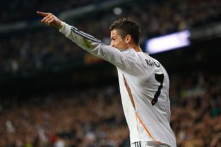 Cristiano Ronaldo celebrates after scoring for Real Madrid against Sevilla in 2013.