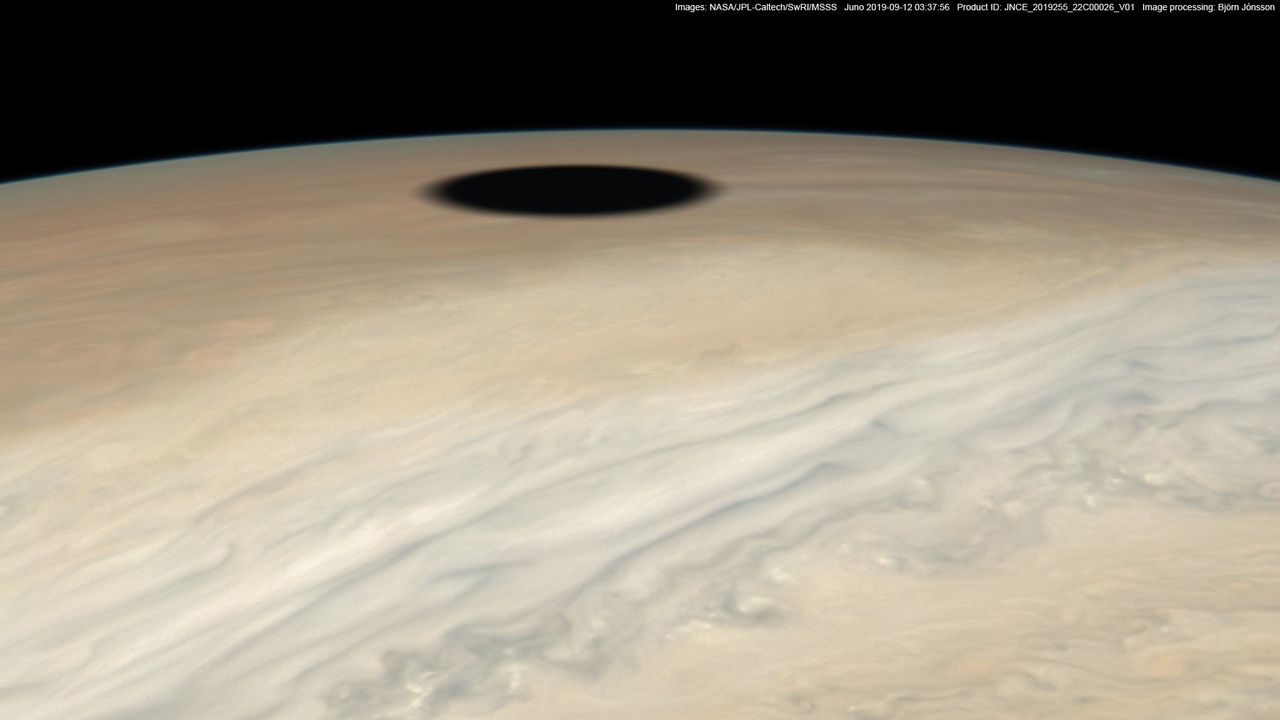 A view of Io's shadow on the surface of Jupiter captured by NASA's Juno probe.