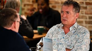 Alfie talks to Ian in the cafe in EastEnders