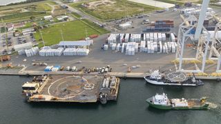 SpaceX's drone ship "Just Read The Instructions" (left) and the GO Navigator (docked at right) and GO Searcher (green ship) are pictured at Port Canaveral.