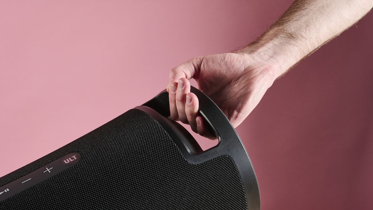 Sony ULT Field 7 speaker's handle held in a man's hand