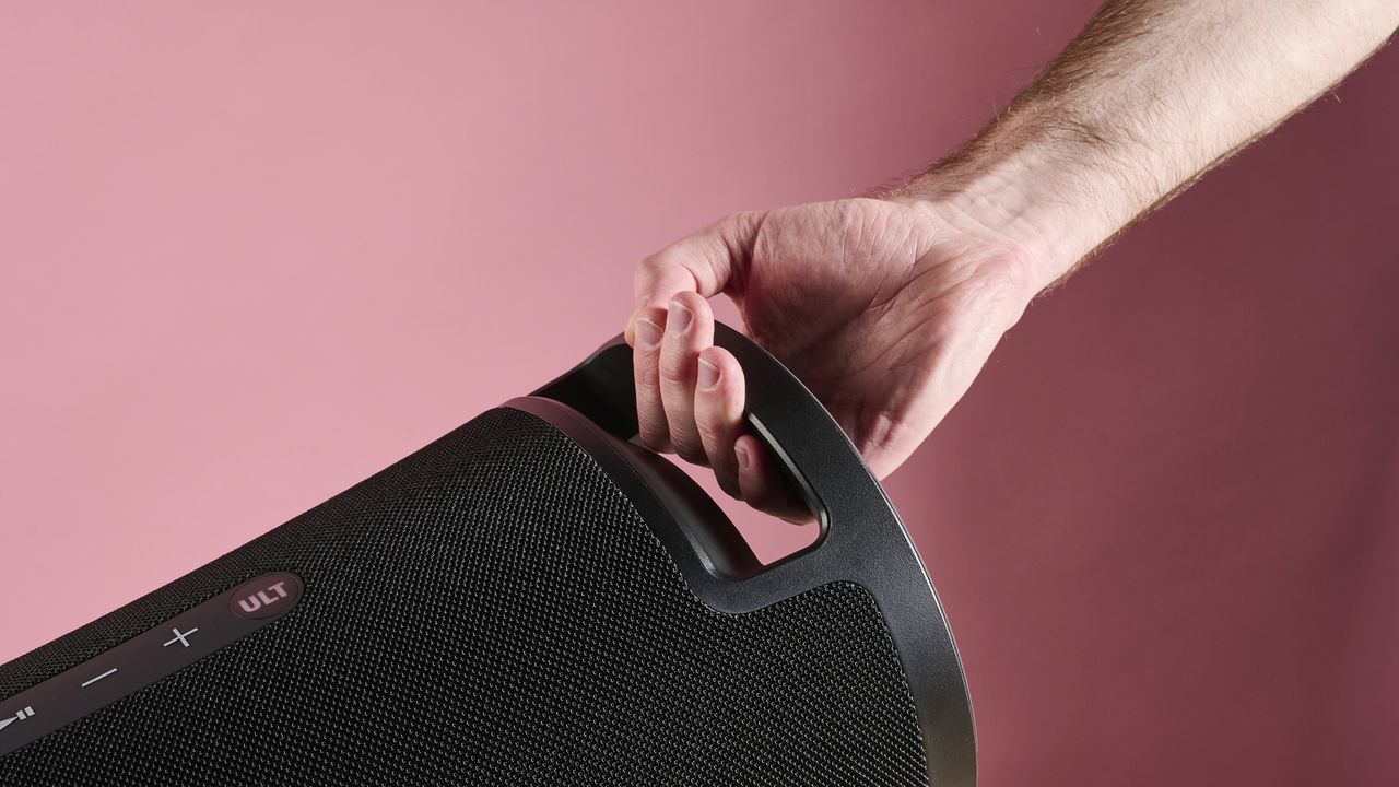 Sony ULT Field 7 speaker's handle held in a man's hand