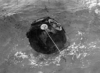 The Soviet Union's Zond 5 capsule is seen during recovery operations in the Indian Ocean after returning to Earth following a trip around the moon with two steppe tortoises and an extensive biological payload. The tortoises survived.