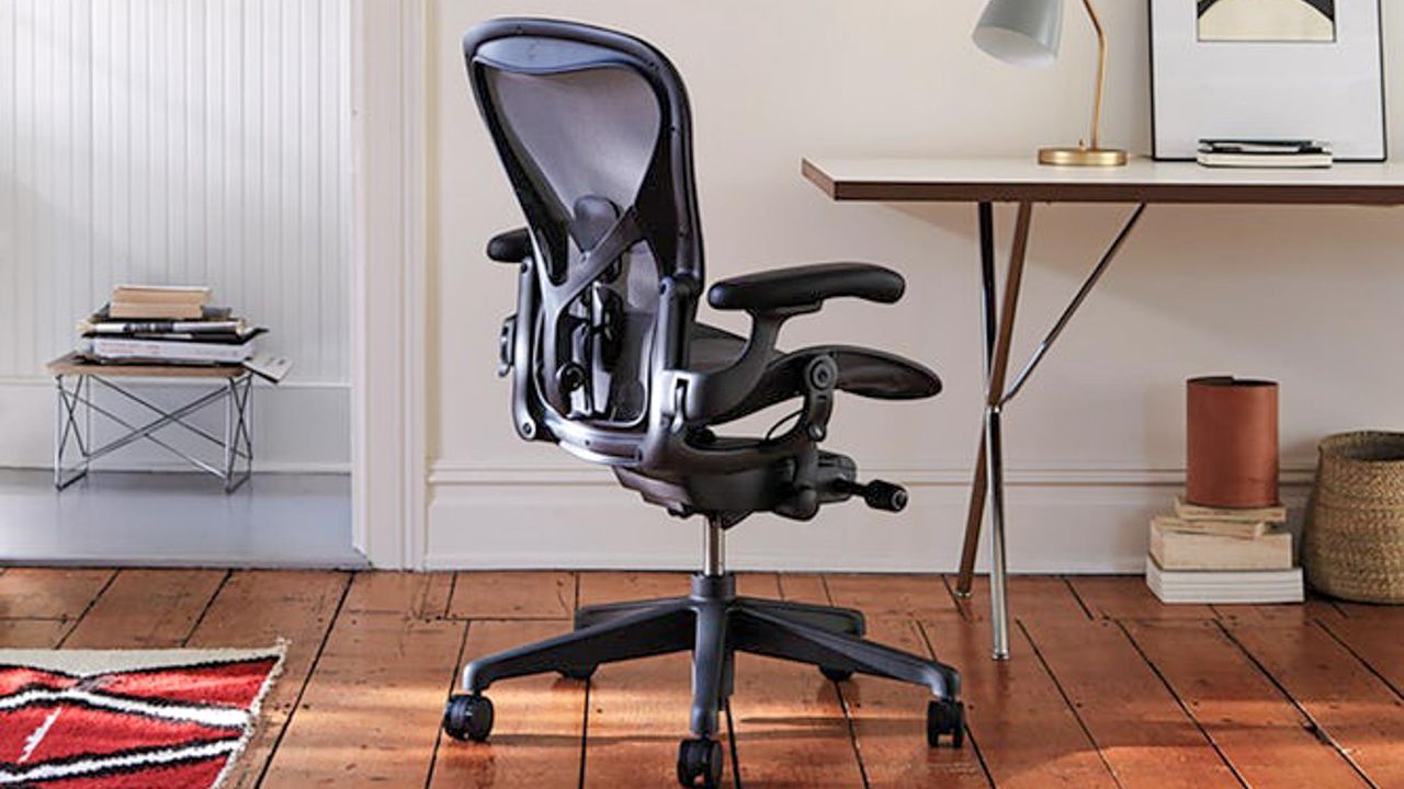 Herman Miller Aeron chair near an office desk