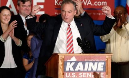 Democrat Tim Kaine pumps his fists as he celebrates his Senate victory in Virginia.