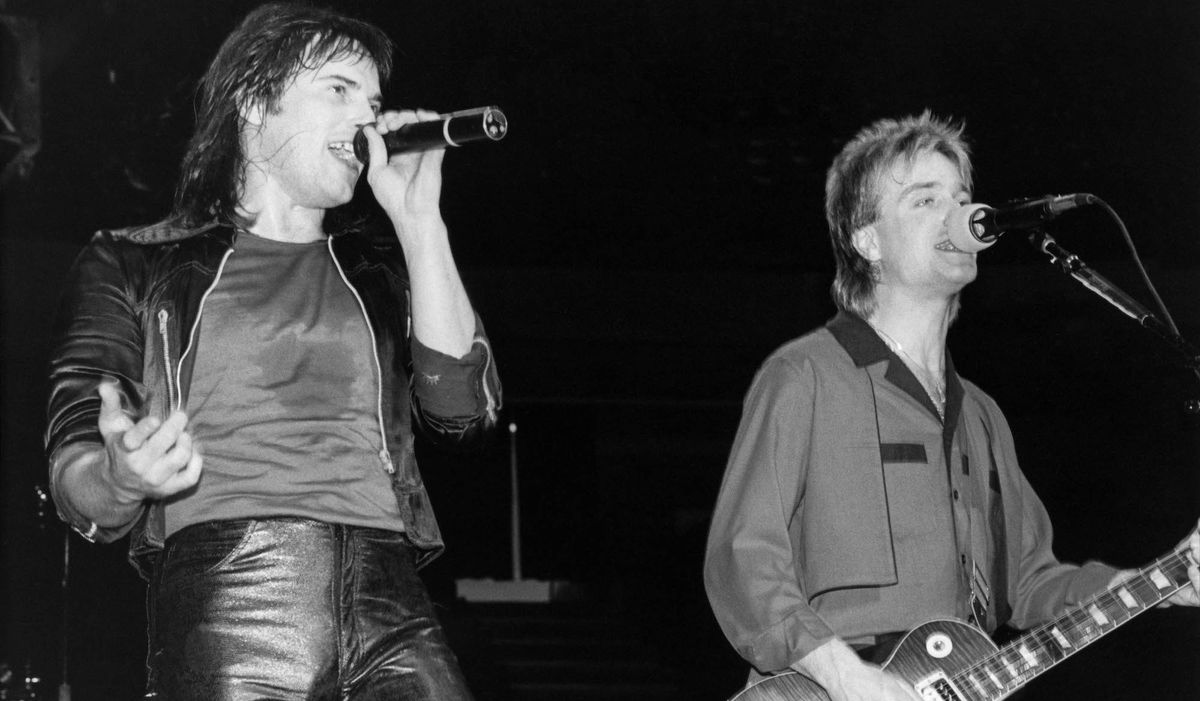 Jimi Jamison (left) and Frankie Sullivan perform onstage with Survivor