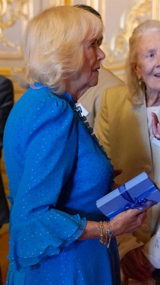 Queen Camilla speaks to Joely Richardson and Vanessa Redgrave during a reception