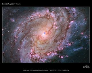 This Hubble Space Telescope view of the spiral galaxy M83 shows location of the microquasar MQ1 marked by a blue circle. Image released Feb. 27, 2014.
