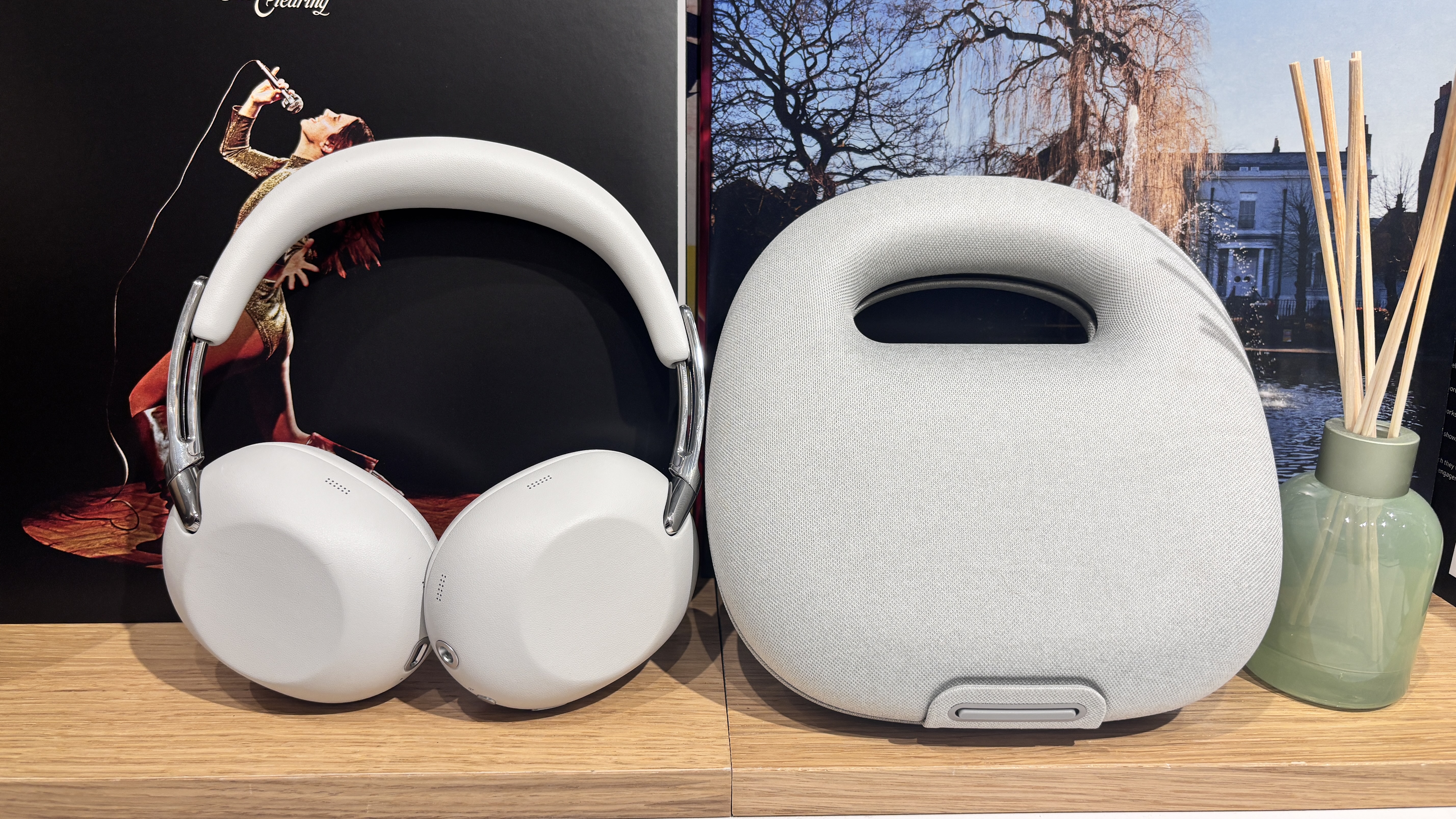 Sony 1000X The Collexion over-ear wireless headphones in white next to their white case