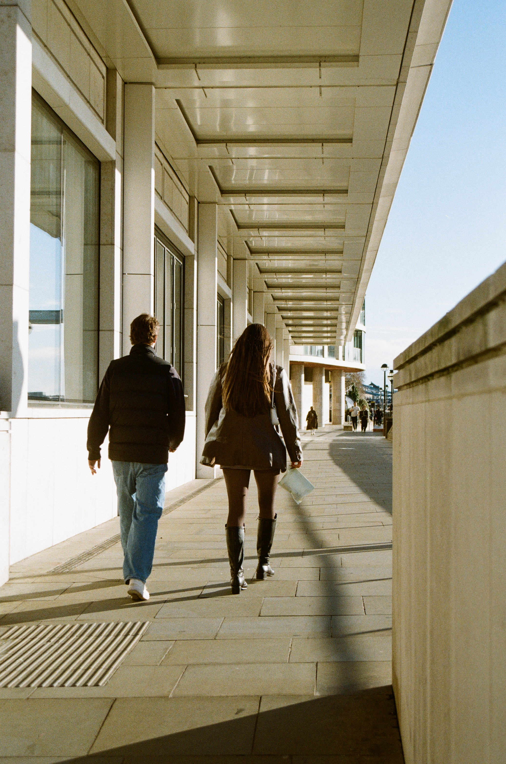 Sample image of Kodak Kodacolor 100 showing couple walking away from camera on riverside path