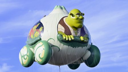 The Shrek’s Onion Carriage balloon taking a test flight in preparation for Macy's Thanksgiving Day Parade 2025