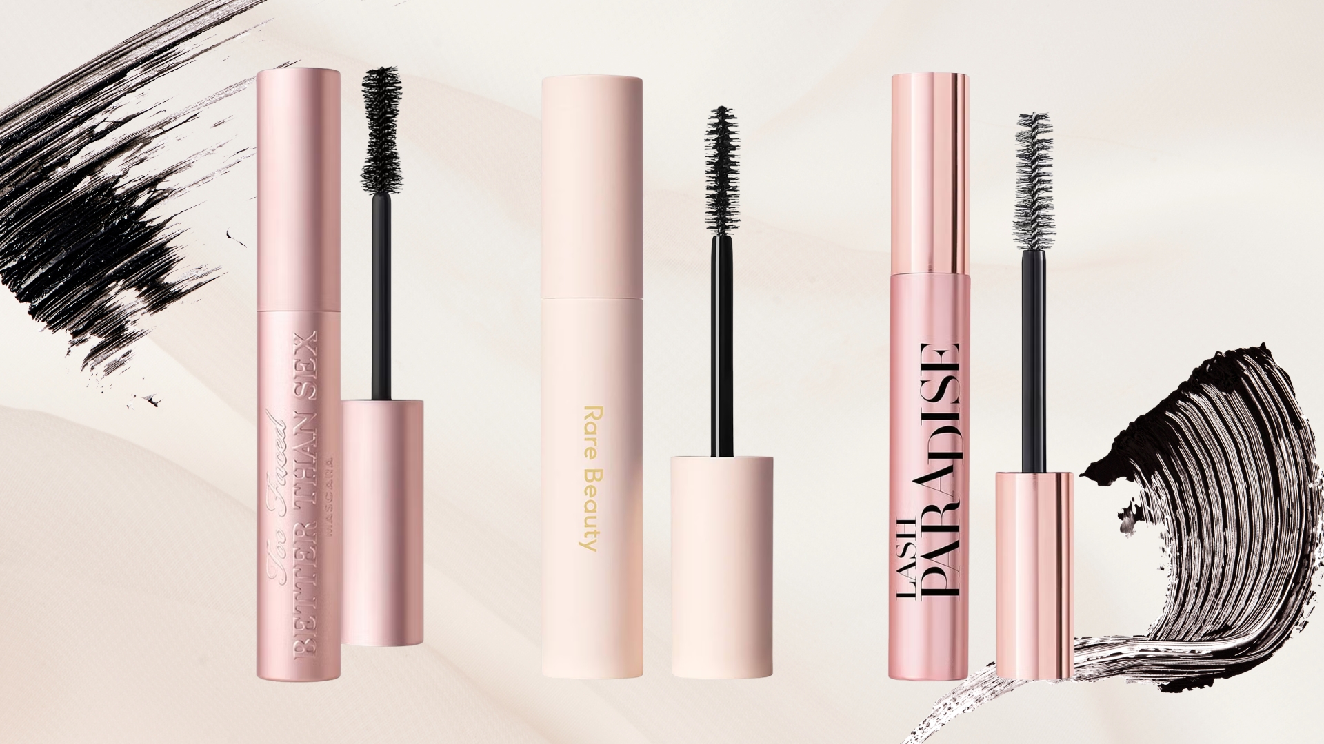 Trio of the best volumising mascara (L-R) from Too Faced, Rare Beauty and L'oreal Paris on a pink background with mascara swatches