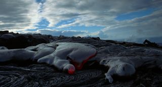 Cooling lava, oozing across the surface of the Earth, in the movie "Voyage of Time: The IMAX Experience."