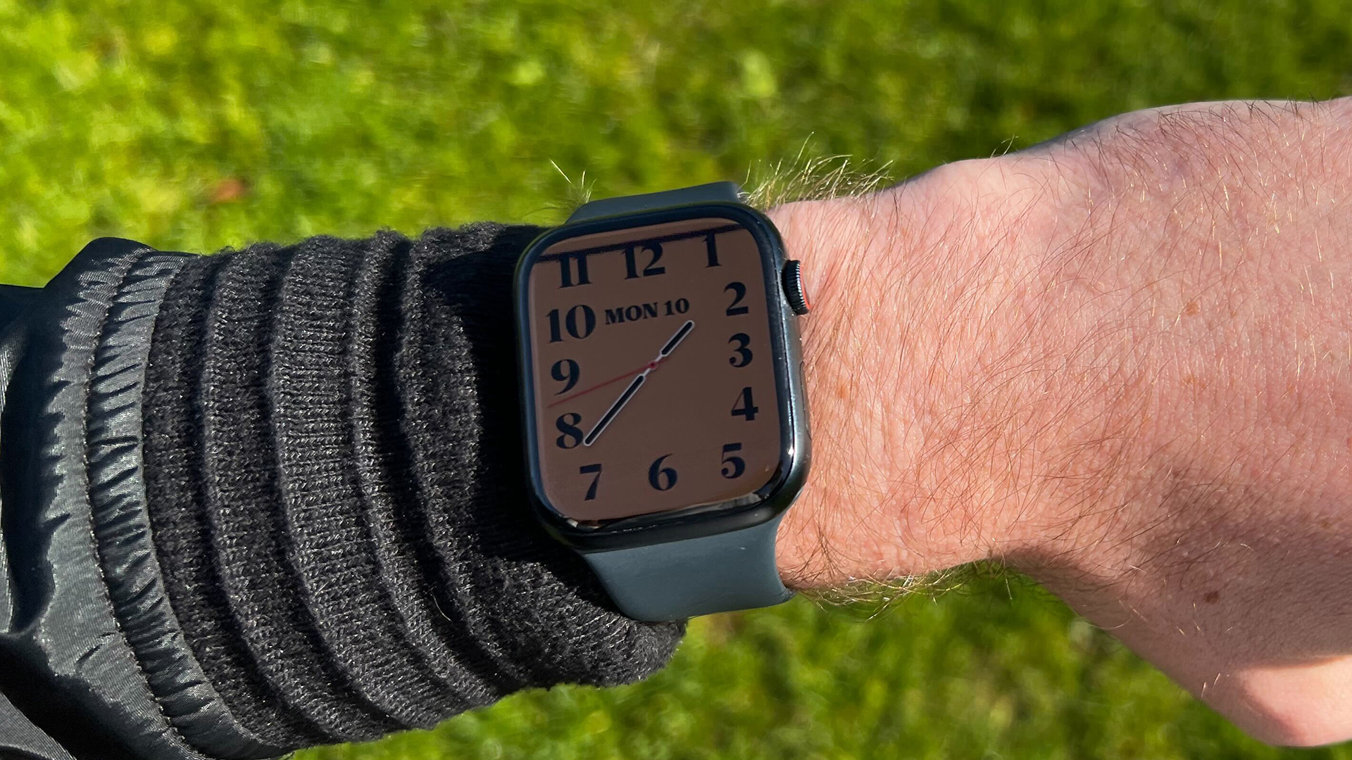 Apple Watch Series 8 worn by a man outside