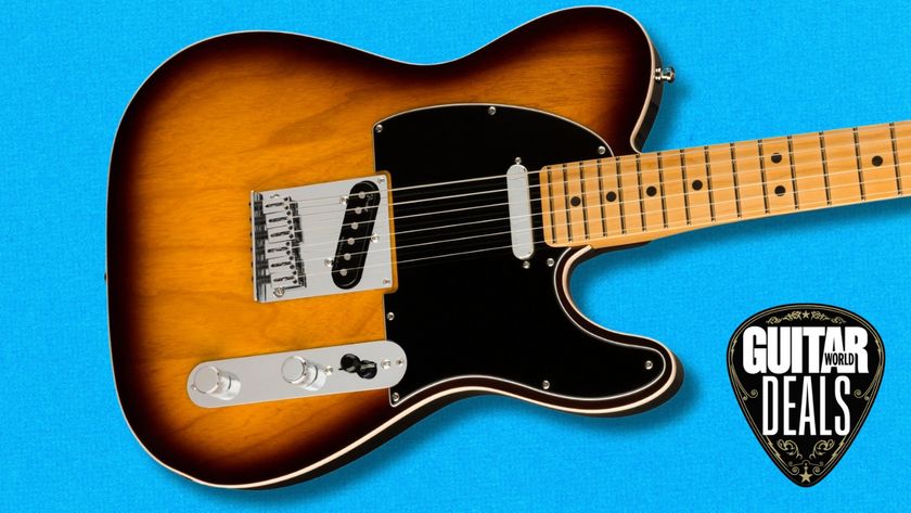 A Fender Telecaster electric guitar on a blue background