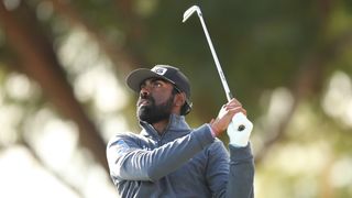 Sahith Theegala hits a golf shot