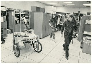 Right: Bruce Baumgart. Hippie, computer scientist, historian, and the world's first documented esports champion. Left: A robot?