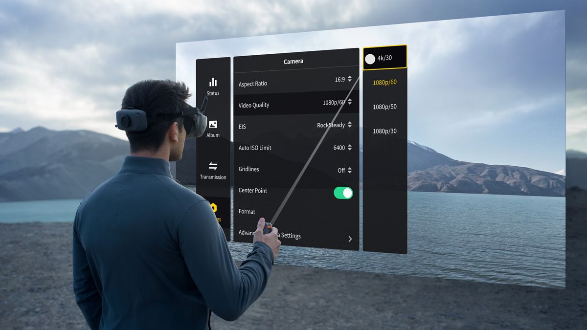 Person wearing DJI Goggles N3 with mountainous backdrop