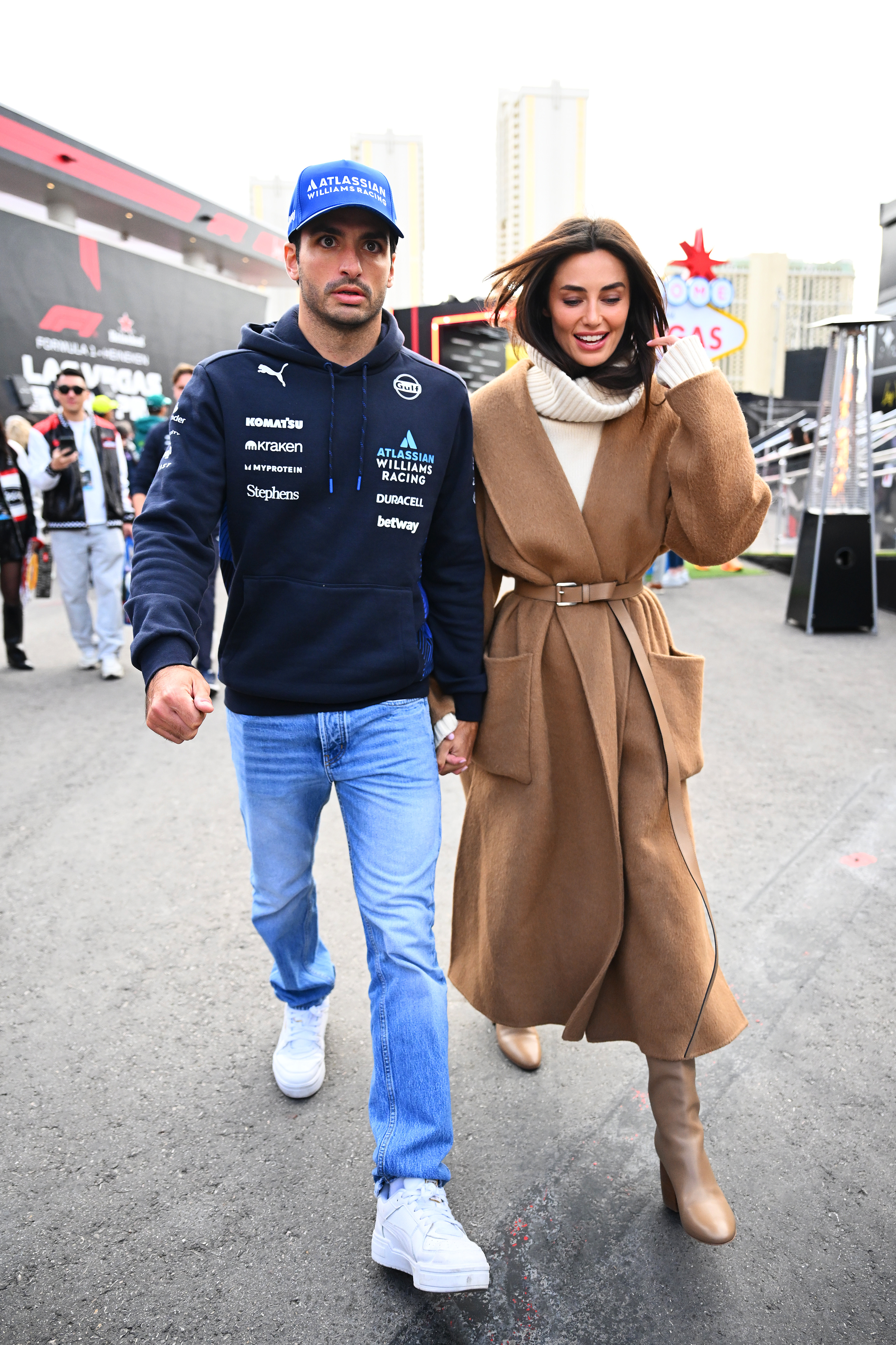 LAS VEGAS, NEVADA - NOVEMBER 22: Carlos Sainz of Spain and Williams and Rebecca Donaldson arrive in the Paddock prior to the F1 Grand Prix of Las Vegas at Las Vegas Strip Circuit on November 22, 2025 in Las Vegas, Nevada.