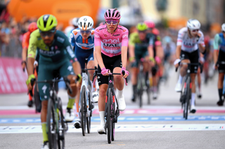 Tadej Pogačar rolled home safely on stage 18 to maintain his Giro d'Italia lead